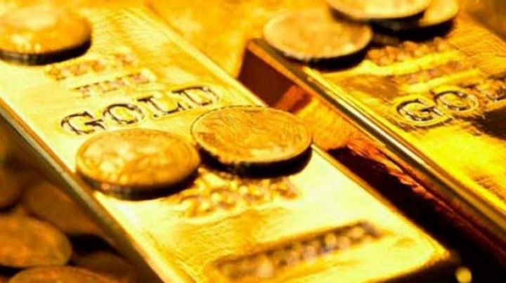 Qızıl güclü dollar ilə ucuzlaşır